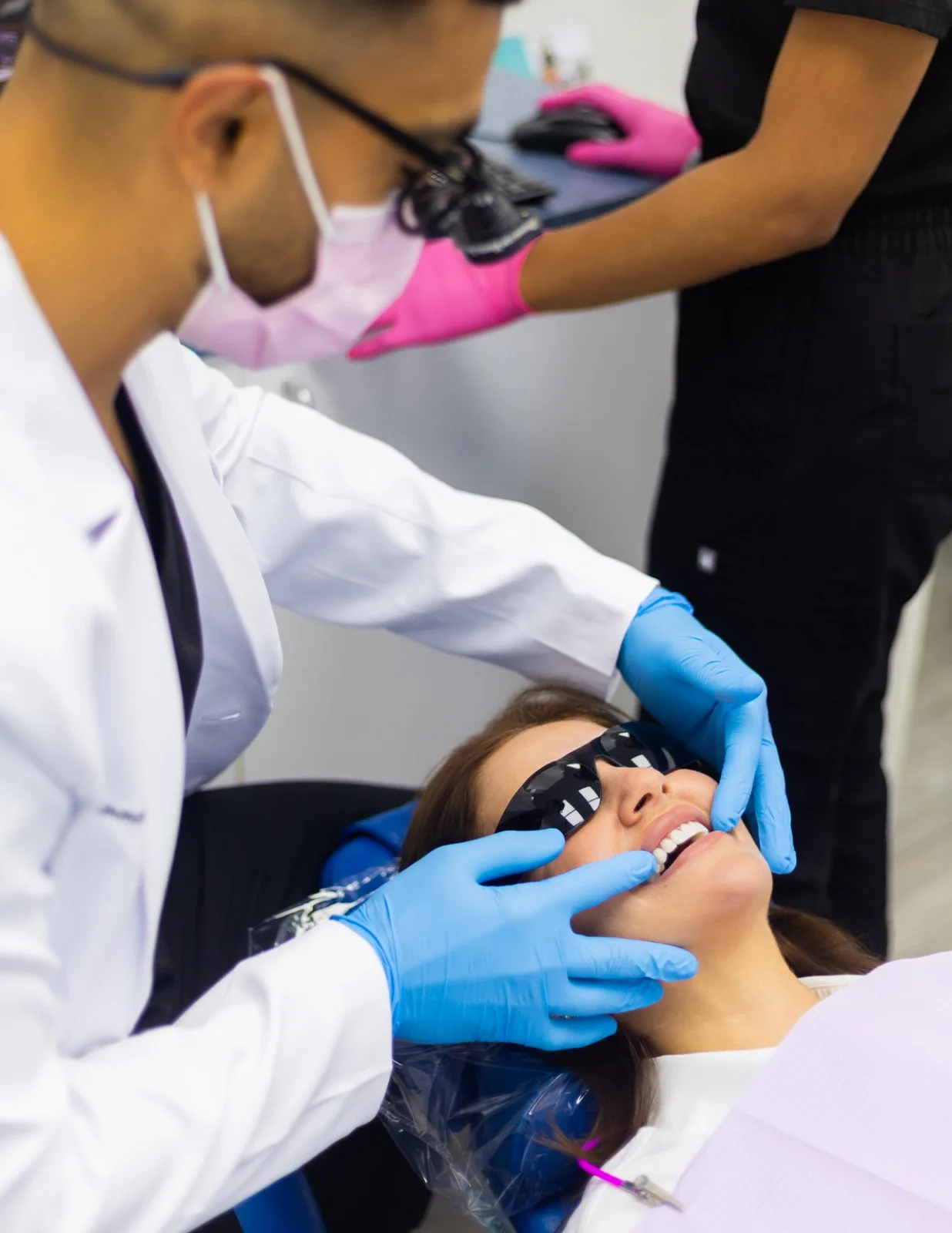 A dentist examining a patient at Advanced Dental Care of Fredericksburg